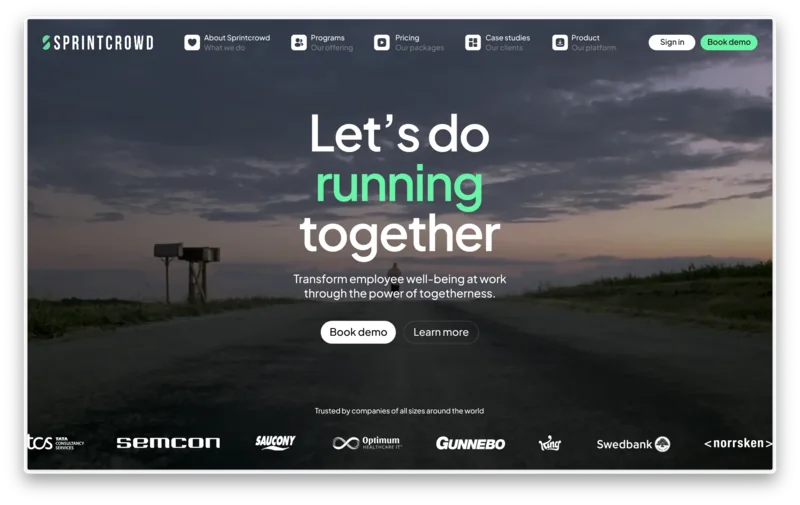 Sprintcrowd website hero over a dusk running scene